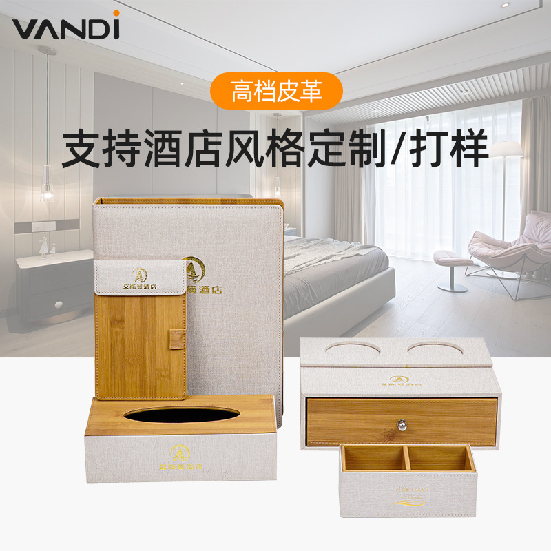 Hotel service guide for hotel accommodations with logo in leather tea boxes and trash cans