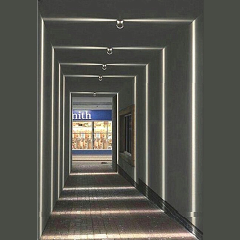 A new LED window lamp with a light in the corridor of the KTV bar outside the perimeter of a round window at the 10W Hotel.