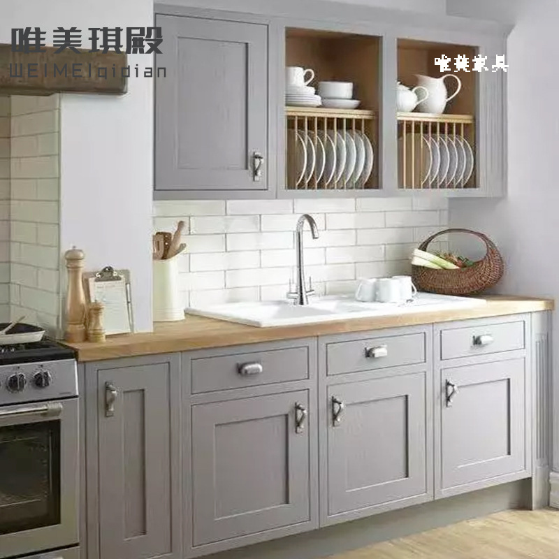 The whole kitchen cabinet is customised, modern, simple and economical, marble stainless steel cabinets are customised.