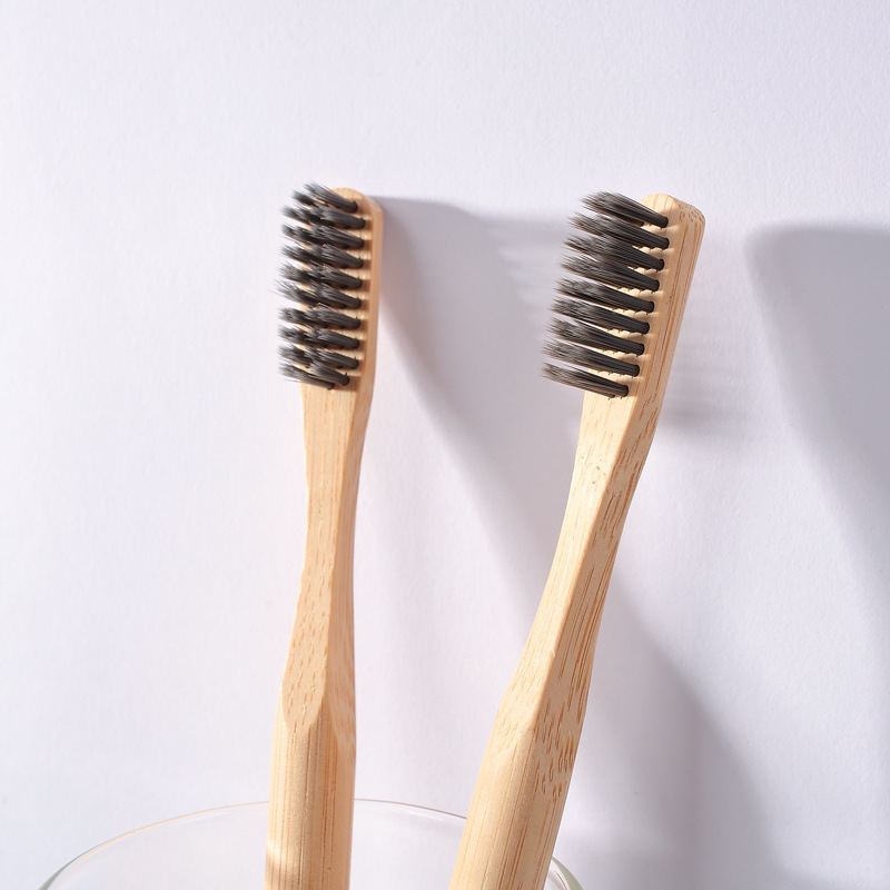 Good-quality, soft-haired, non-one-time toothbrush cane-carving Logo.