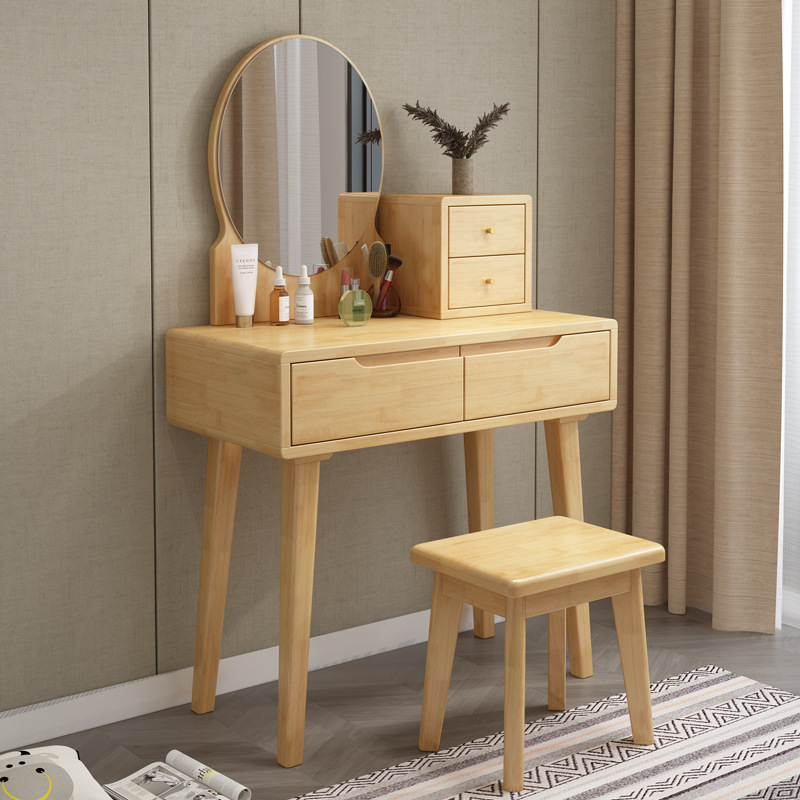 A small mini-cosm table with a small red-frozen red-frozen, modern-day cabinet in the Nordic wood dresser bedroom.