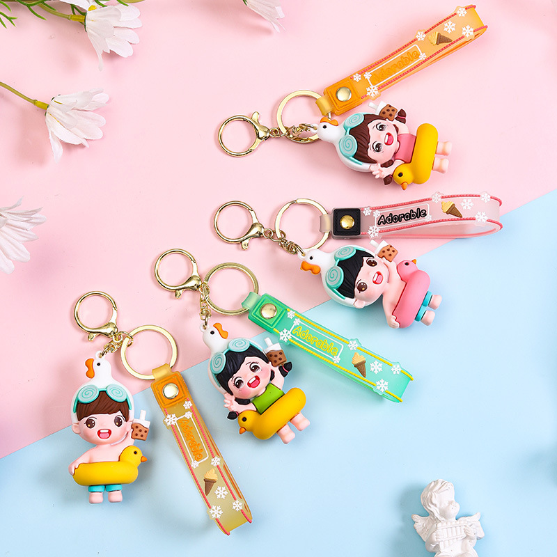 Con vịt đỏ, chìa khóa dễ thương để gắn kết quà sinh nhật sáng tạo, hàng hóa được đóng gói đẹp.