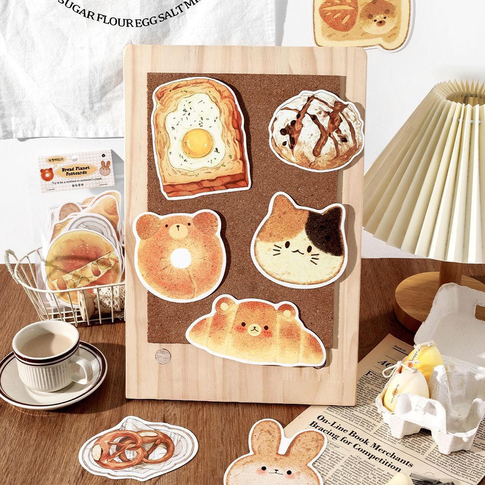 Trong bưu thiếp ấm áp, hành tinh bánh mì, sinh viên chủ đề bánh mì để lại lời nhắn cho những quân bài.