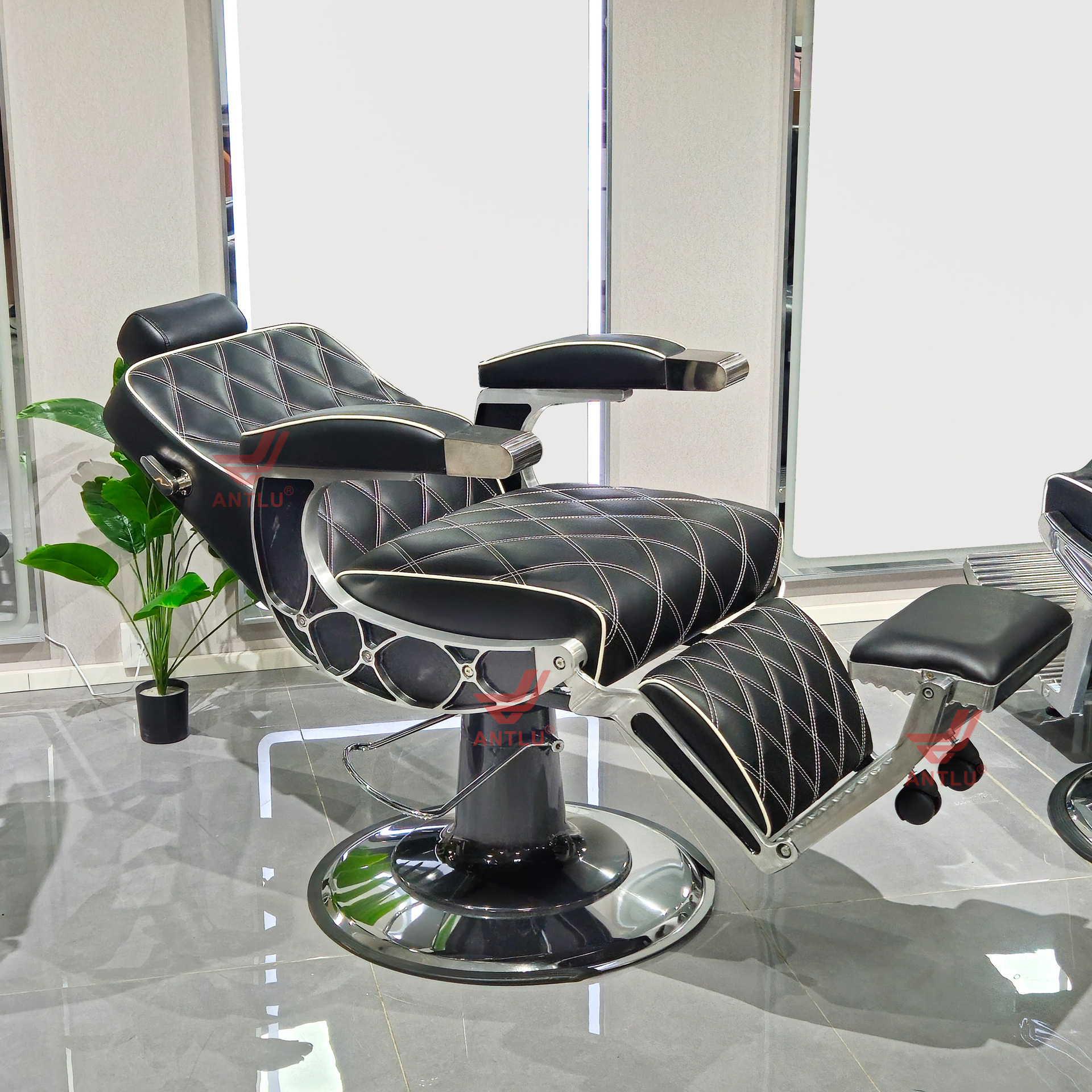 A barber's barber's barber's shaved chair will bring down the chair's barber's chair to the rotating chair.