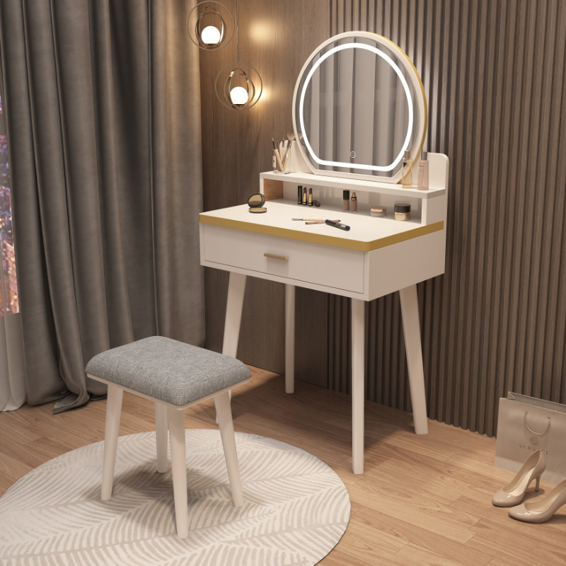 A small Nordic dresser in the wood dressing table. A modern, simple dresser table with a red light.