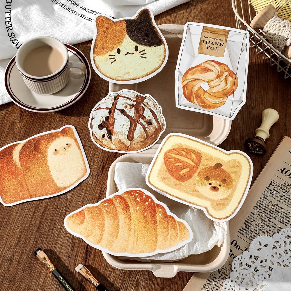 Trong bưu thiếp ấm áp, hành tinh bánh mì, sinh viên chủ đề bánh mì để lại lời nhắn cho những quân bài.
