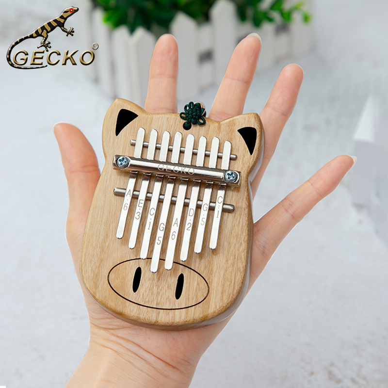 The gECKO gecko with the kalimba-fingered piano with your thumb.