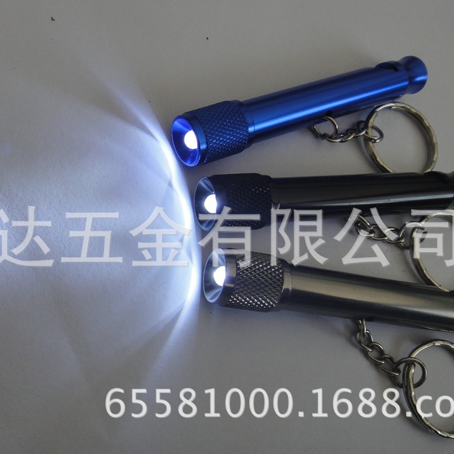 The manufacturer's multipurpose aluminium alloy flashlight, gift keys to the mini-Japan Market flashlight with whistles.