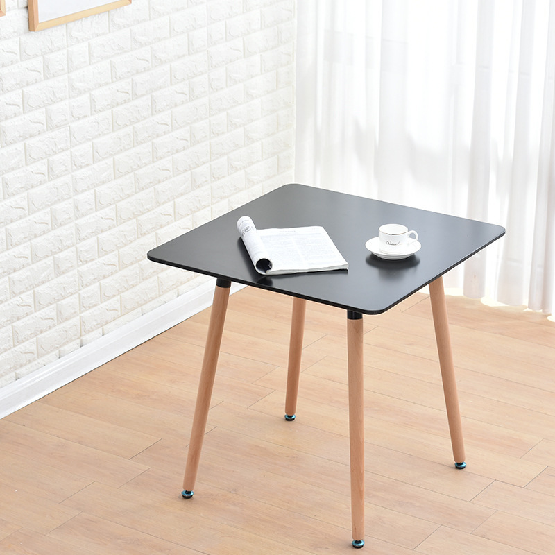 A simple, small, home-based, modern Nordic leisure table, square white table for four people.