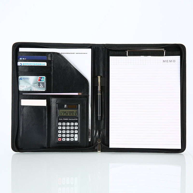 Leather portfolio A4 folder organisers are all zipped up Padfolio and calculator and