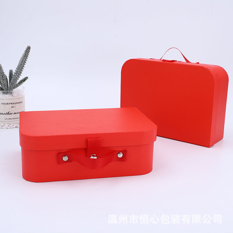 It's custom-made to flip a red gift box and get a big load of sugar box for the wedding.