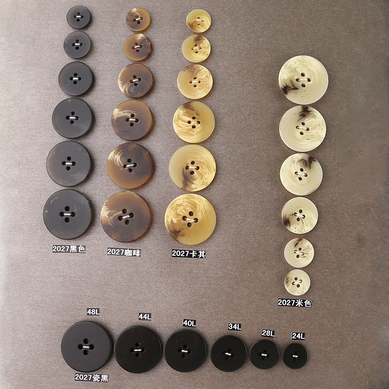 厂家直销现货批发新款高档树脂纽扣西装大衣风衣裤子四眼圆形扣子