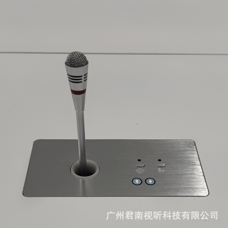 The table of Junnan's conference room is customised to the microphone's hidden noise office chair.