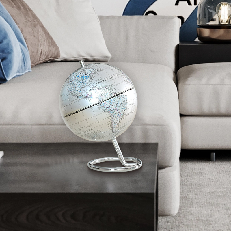 Light Luxury Globe set up a high-end office desk creative modern living room.