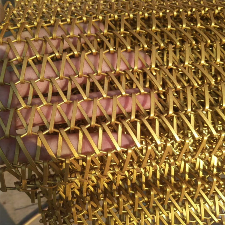 Wholesale supply of a gold-coloured flat-wire conveyor belt.