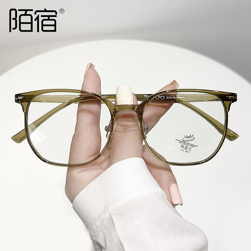 Big frame glasses with a light-looking, light-faced, blue-lighted polygonal wood.