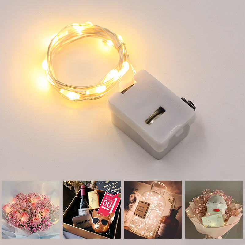 LED copper-lined battery festivities star-forming flower cake box with button-coated lights