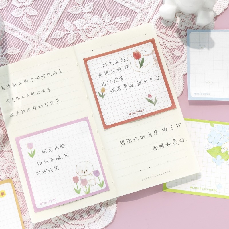 Người ký hiệu A8 đầu tiên, khu vườn, tờ giấy vuông đáng yêu, và rồi anh ký vào cuốn sách.
