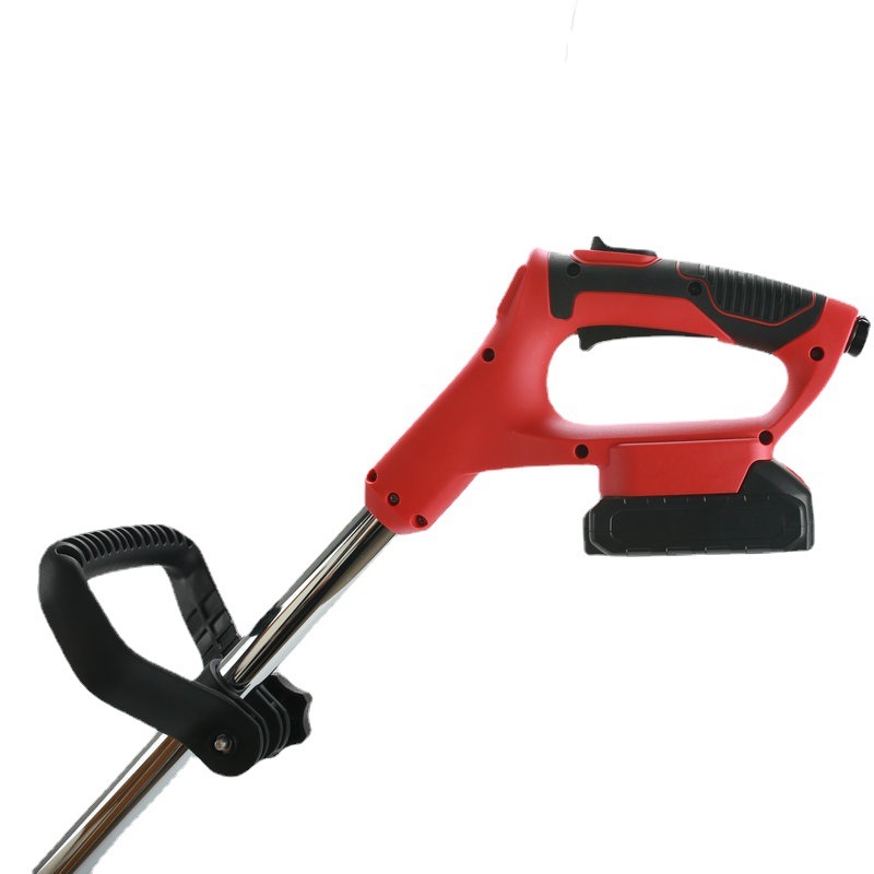 Một máy cắt cỏ căn hộ với bộ làm vườn nhỏ trên máy cắt cỏ và máy cắt cỏ li-ti