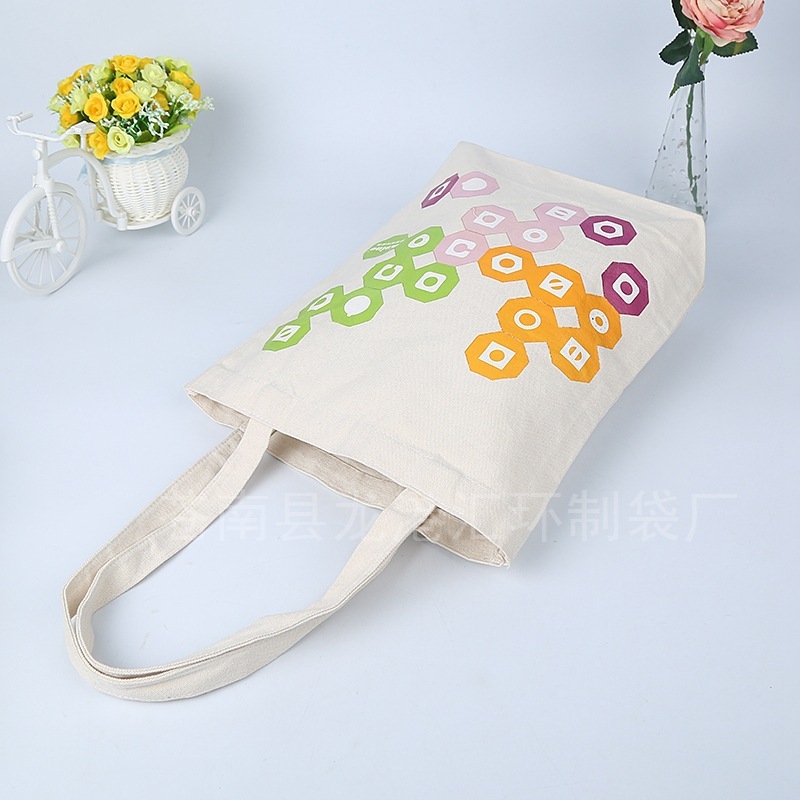Wholesale of the factory, hand-printed ads, hand-held cotton bags, clothes-shopping canvas bags, printable logo.