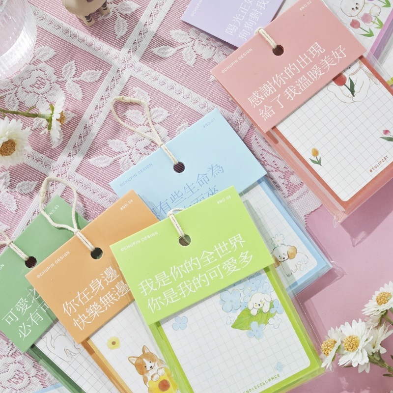 Người ký hiệu A8 đầu tiên, khu vườn, tờ giấy vuông đáng yêu, và rồi anh ký vào cuốn sách.