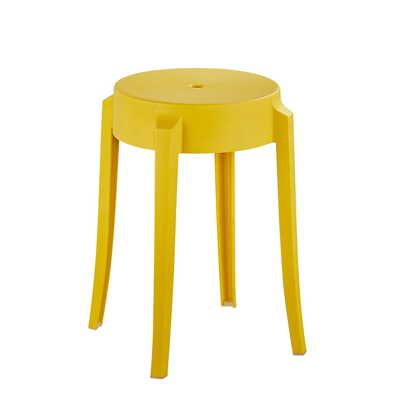 A small chair with a colored chair in the Fashion Creative Hall with a thick adult plastic table.