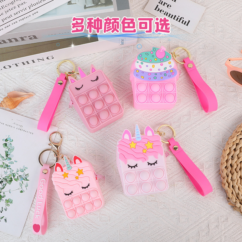 Sắp xếp các chìa khóa kỳ lân mới cho không ví, và không khí thời trang có thể mang theo một túi silicon màu sắc.