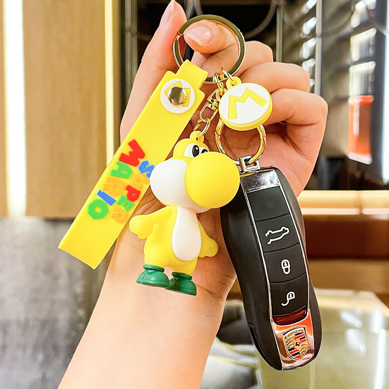 Một món quà nhỏ từ xe hơi bong bóng màu đỏ được cài vào túi một cô gái đáng yêu.