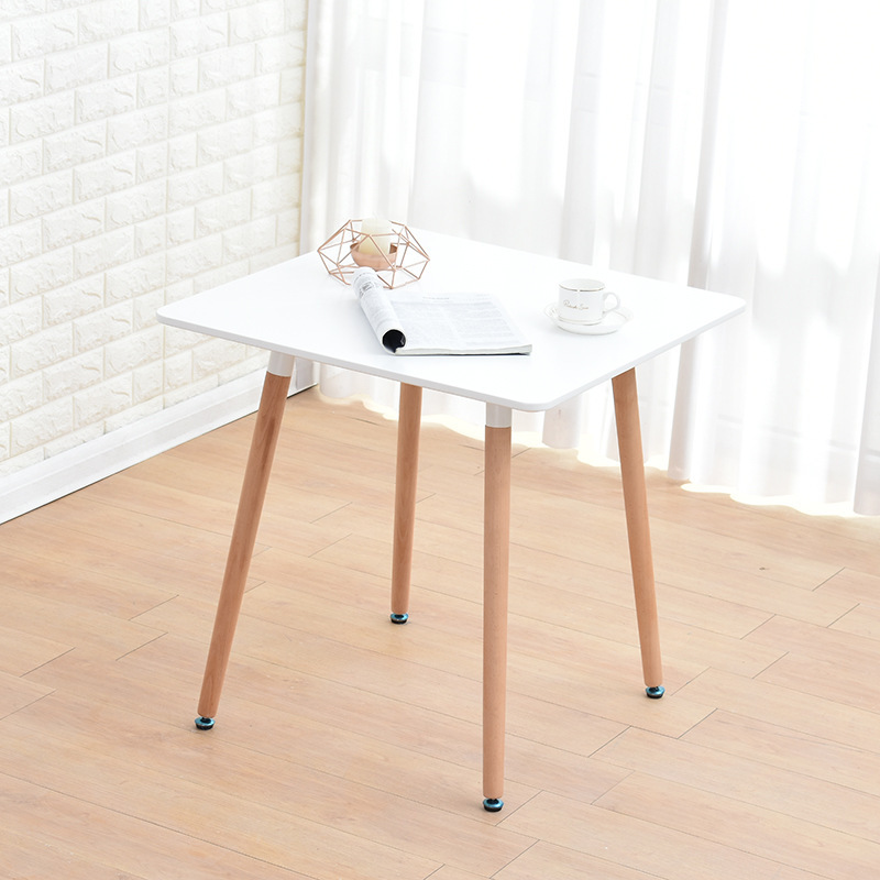 A simple, small, home-based, modern Nordic leisure table, square white table for four people.