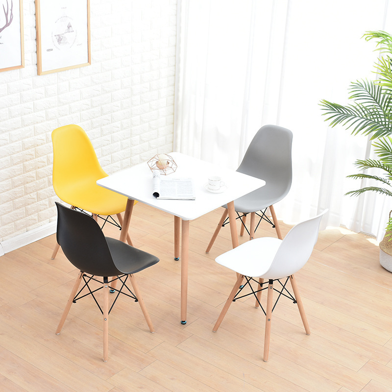 A simple, small, home-based, modern Nordic leisure table, square white table for four people.