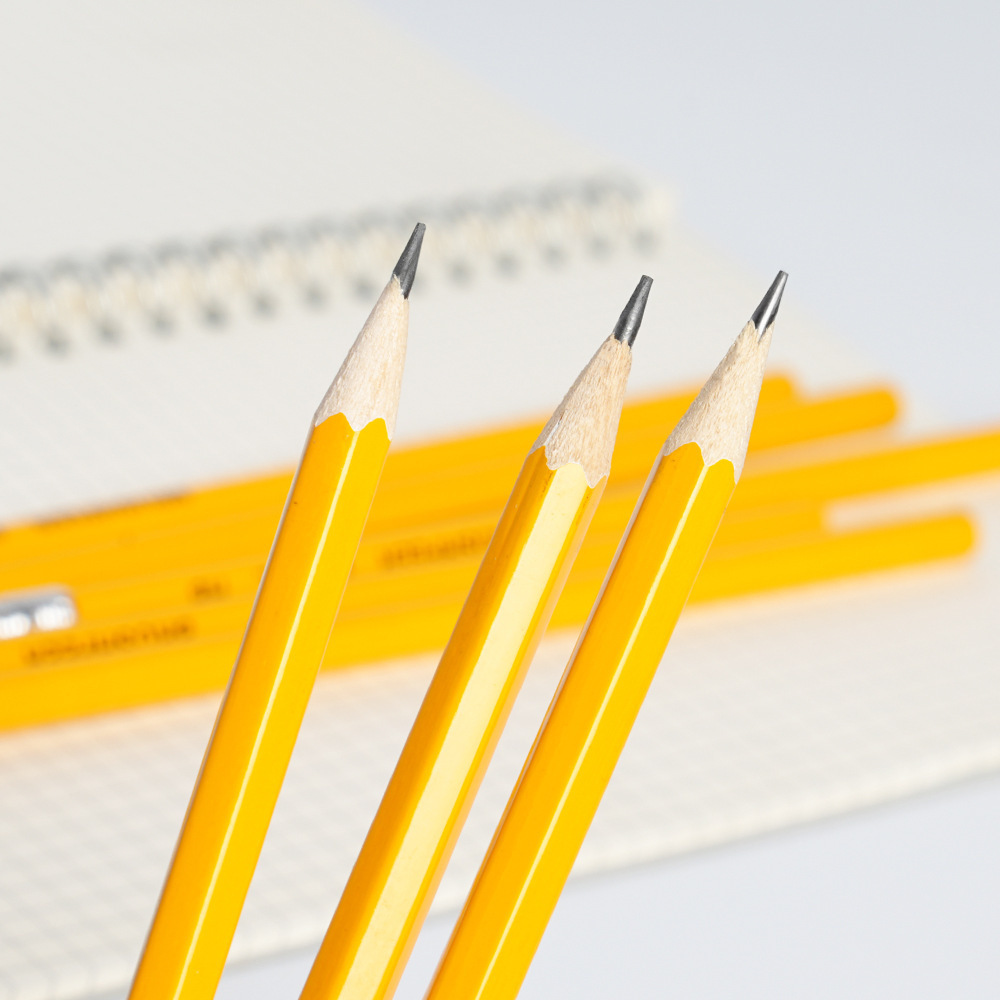 A pencil with a yellow bar with a hab-head and a pencil with a six-point-bar kid's stationery needs to start school.