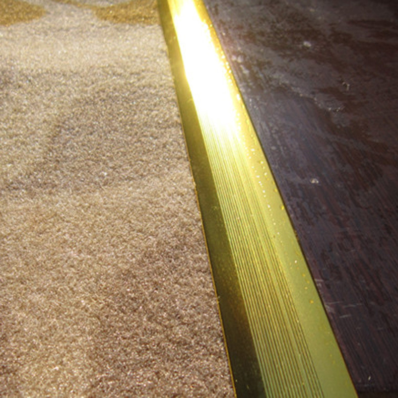 A two-metre silver-coloured 2-metre aluminium Z penthouse bar on the side of the carpet store at Walt's mall.