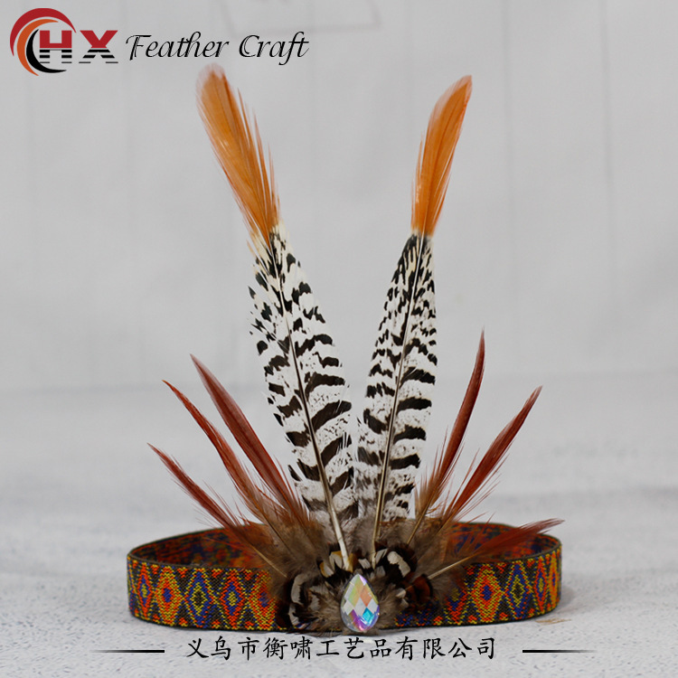 "Packing Indian feather hairs with pheasant hairs on top of African tiara tiara show stage prop."