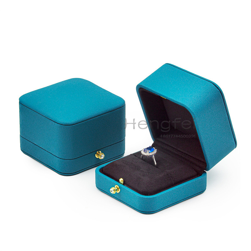 A box of high-quality pup diamond ring jewelry box customised to a locket box with a necklace.