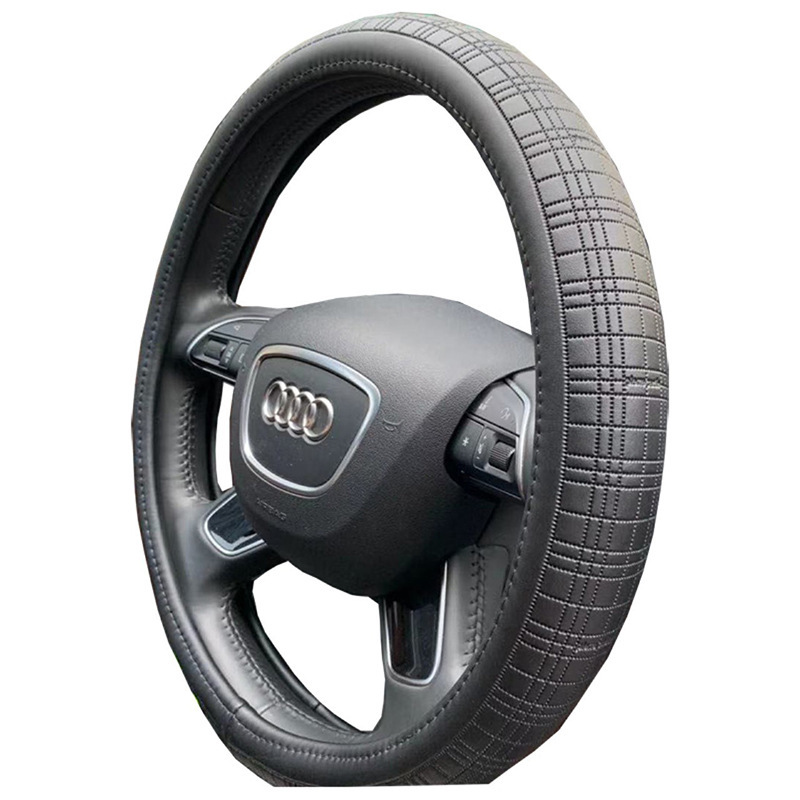 A leather car steering wheel with a smooth-drive massage about four seasons of general cross-border electrician leather.