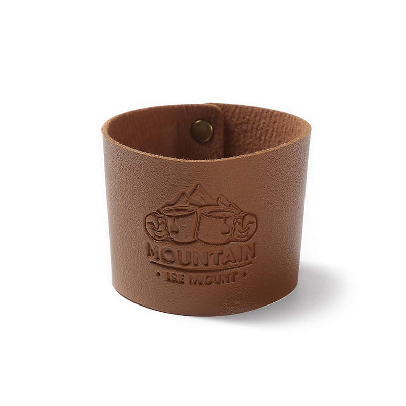 Camp stainless steel cup and water cup insulated from hot and hot coffee cup and leather protection.