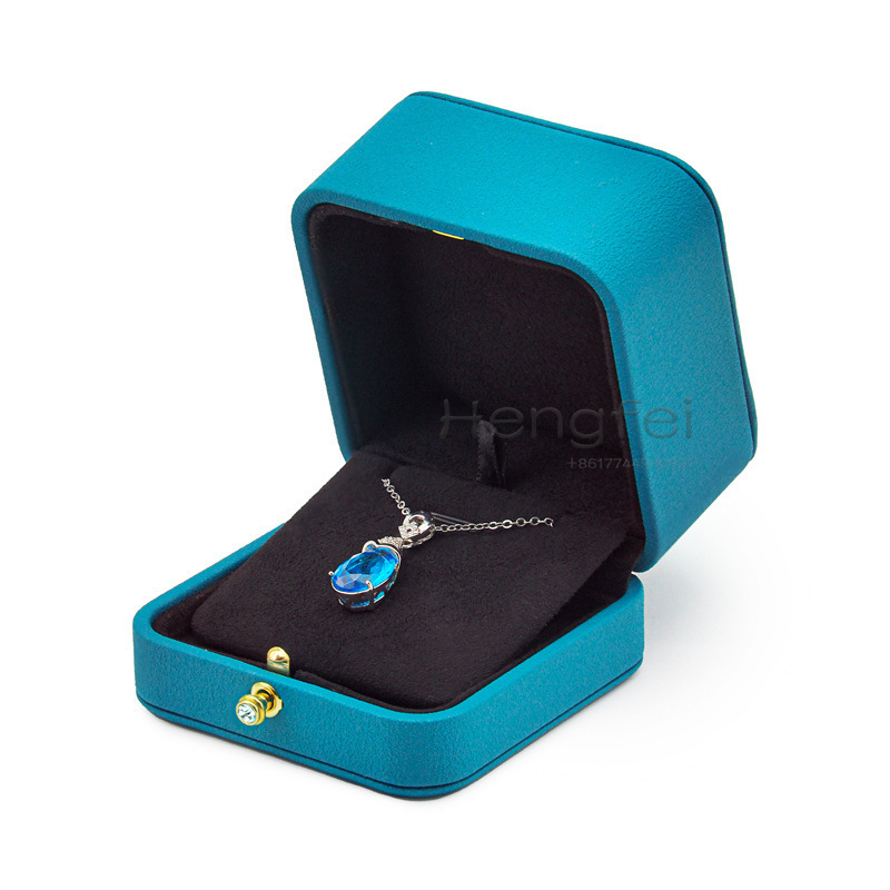 A box of high-quality pup diamond ring jewelry box customised to a locket box with a necklace.