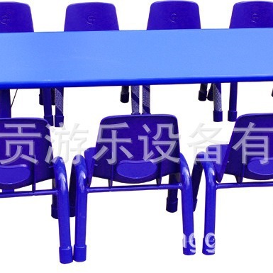 A table for 10 people at a table with a table and a chair at a kindergarten.