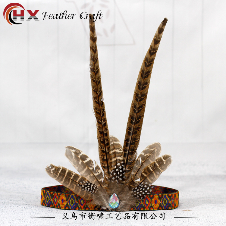 "Packing Indian feather hairs with pheasant hairs on top of African tiara tiara show stage prop."