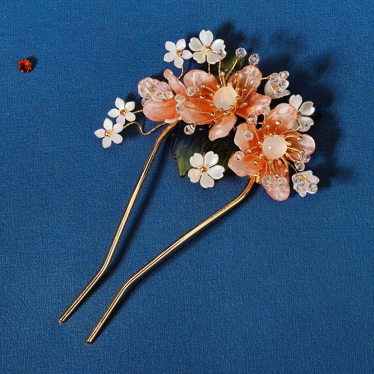 A new Chinese dresser 와 a bouquet 의 부케 과 a bouquet 의 부케 과 bouquet 의 a crystal pin.