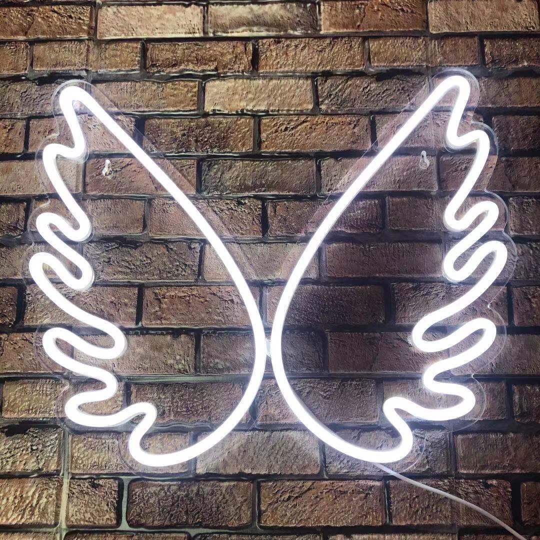 The wings of the new led neon light interior decorated with a transparent backboard of neon light child gift angel.