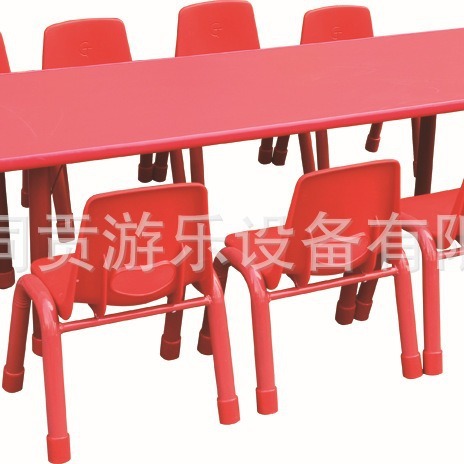 A table for 10 people at a table with a table and a chair at a kindergarten.