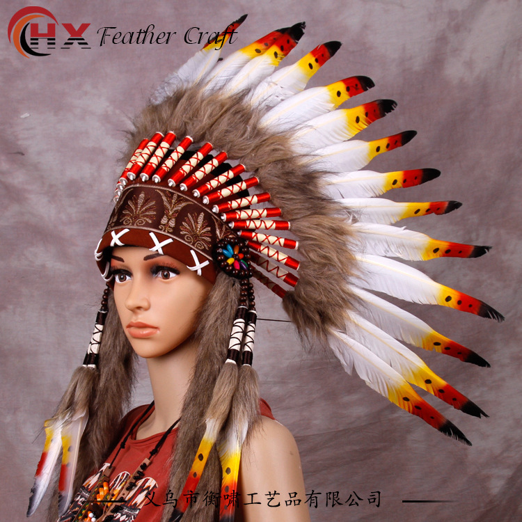 "Packet ball costumes, colored feathers, Indian heads, Indian nobility chief hats."