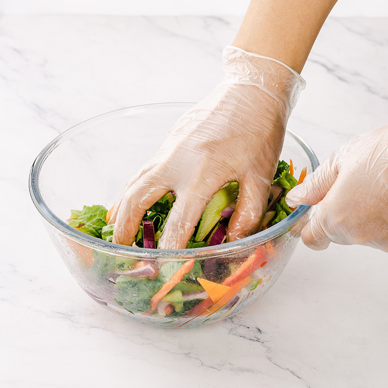 100 women with PVC plastic mint gloves in the PVC kitchens of the Faucet's once-in-time glove food and catering.