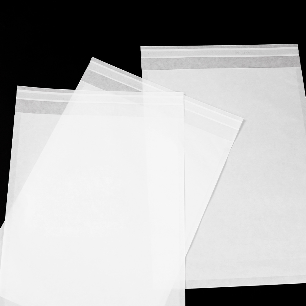 Environmentally degradable Grasing paper bags, self-adhesive and transparent, high-end clothing bags, wax-ray paper bags.