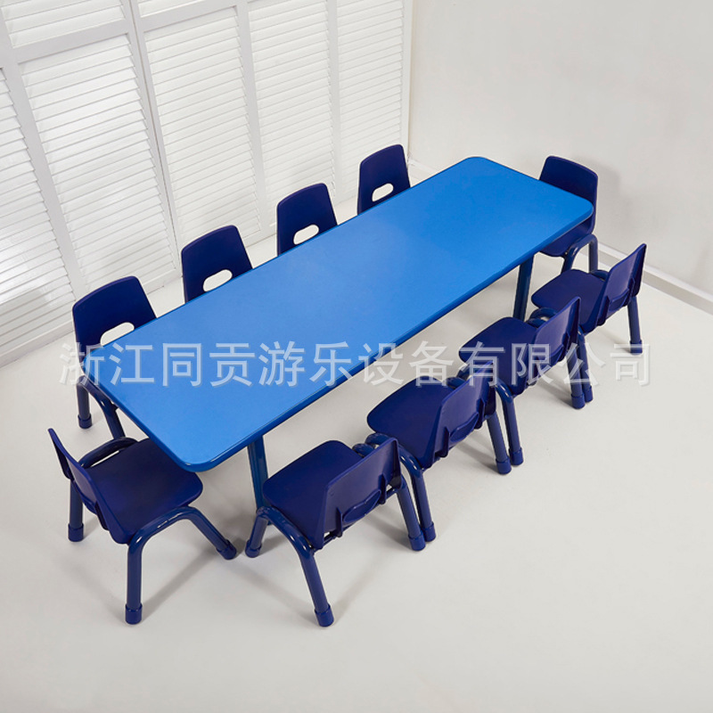 A table for 10 people at a table with a table and a chair at a kindergarten.