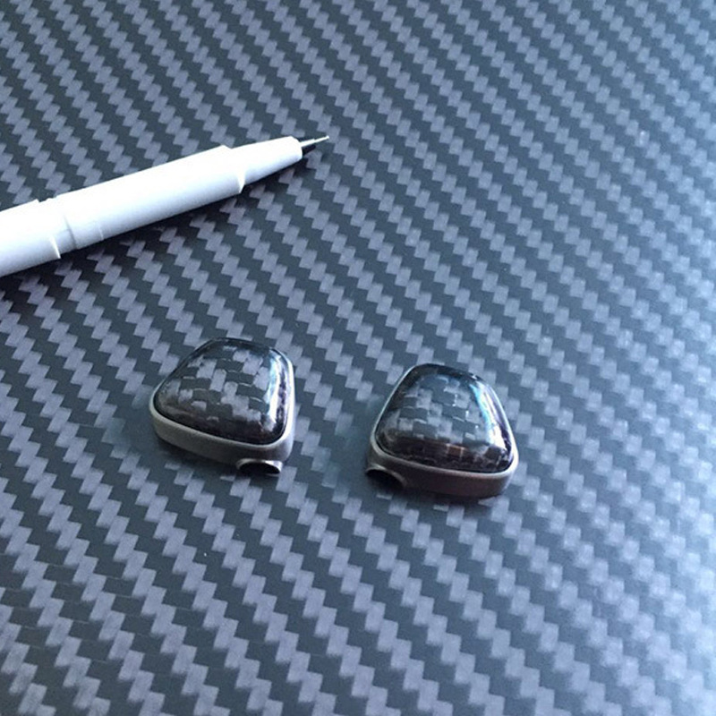 Carbon fibre-fibre ear casings applicable to apple earpieces protected by carbon-fibre-coated shell casings