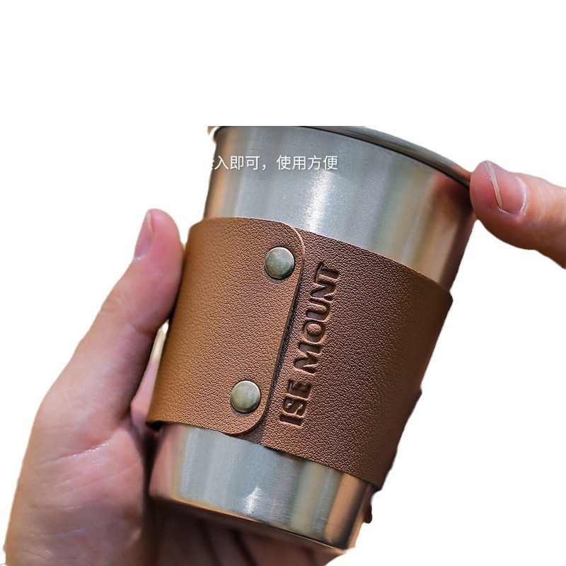 Camp stainless steel cup and water cup insulated from hot and hot coffee cup and leather protection.