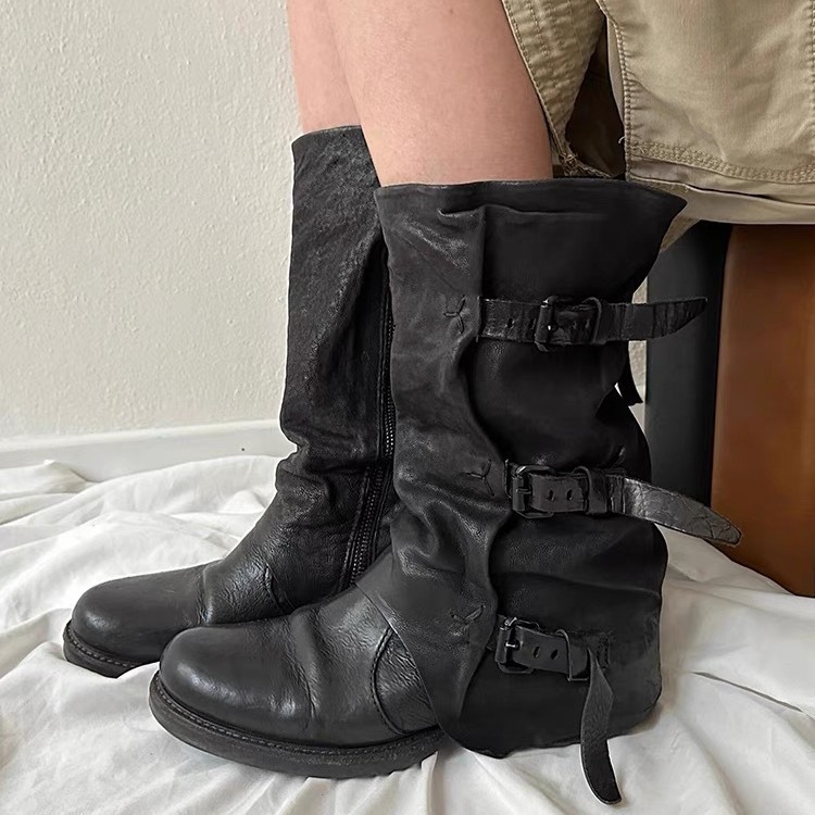 Cow-skin ♪ The old old West Cowboy's Boots in the black pile of boots ♪