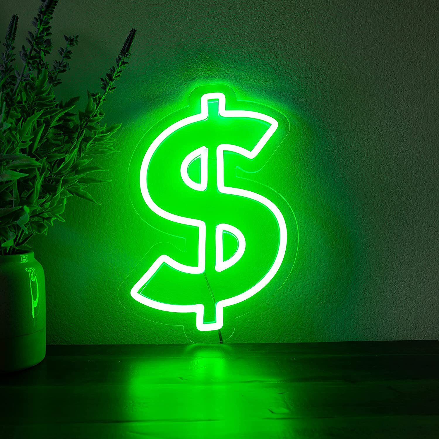 The new led neon light is a green neon sign in dollar shape.